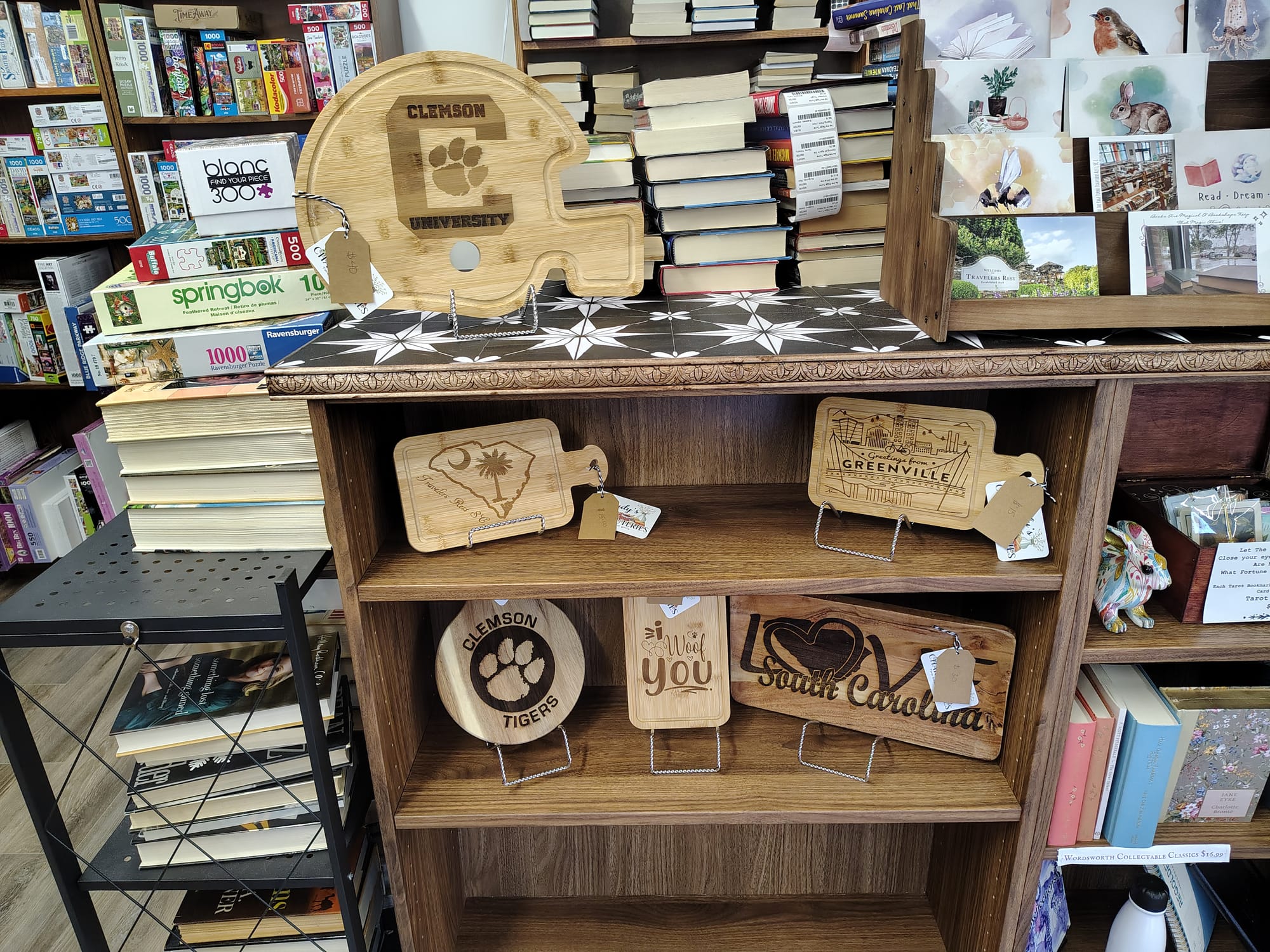 Our boards at As the Page Turns book store in Travelers Rest
