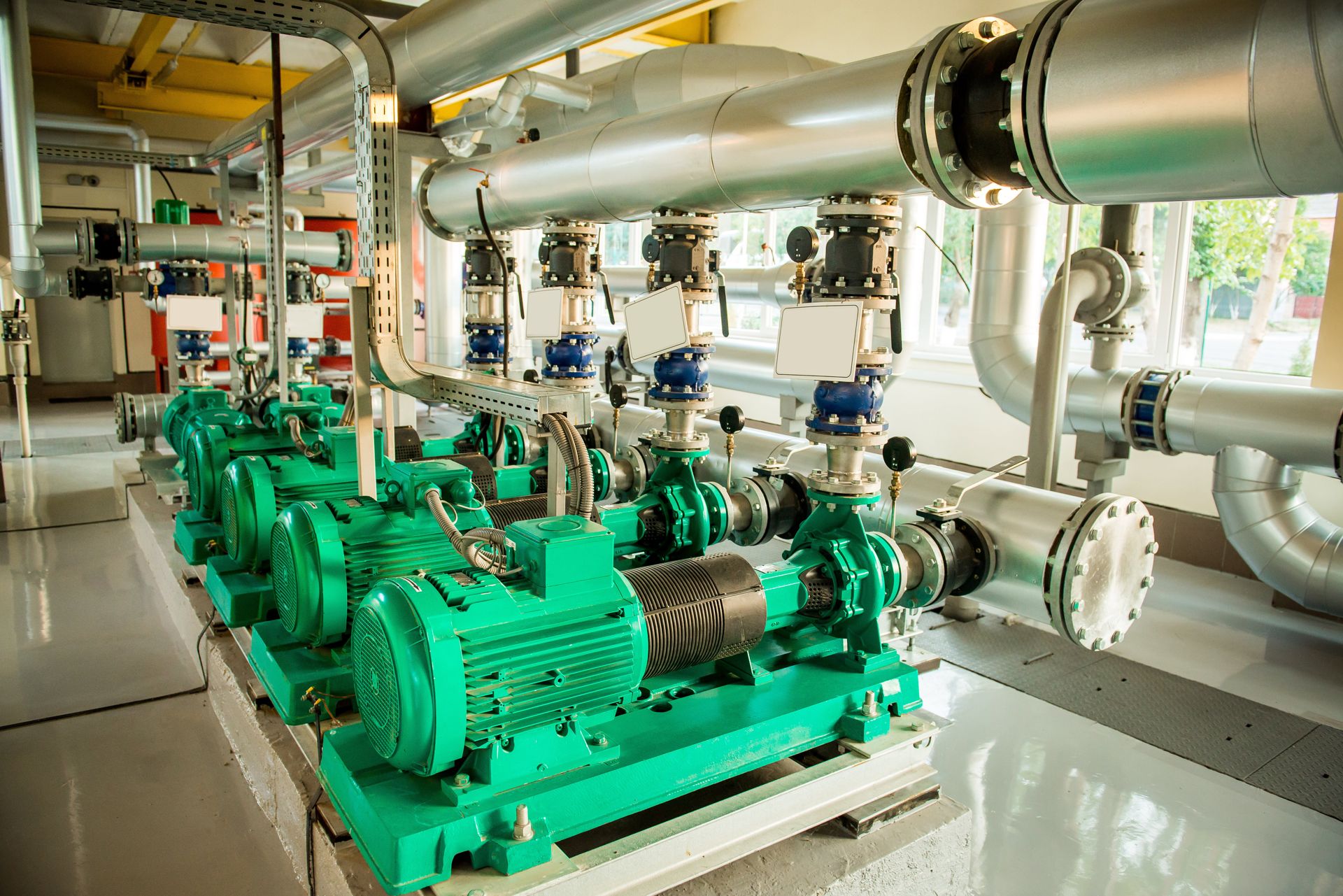 Commercial boiler house pumps and insulated heating pipework