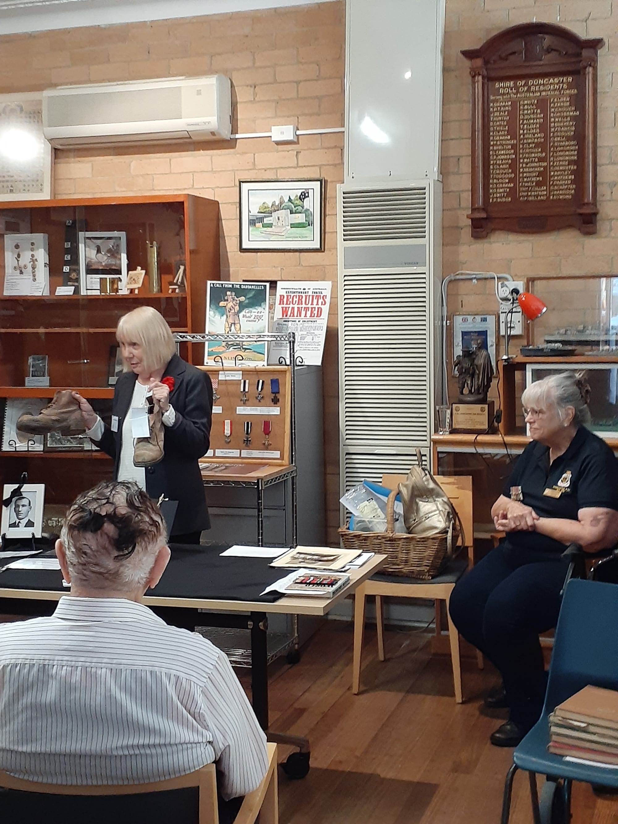 Joan and Bronwyn explaining memorabilia