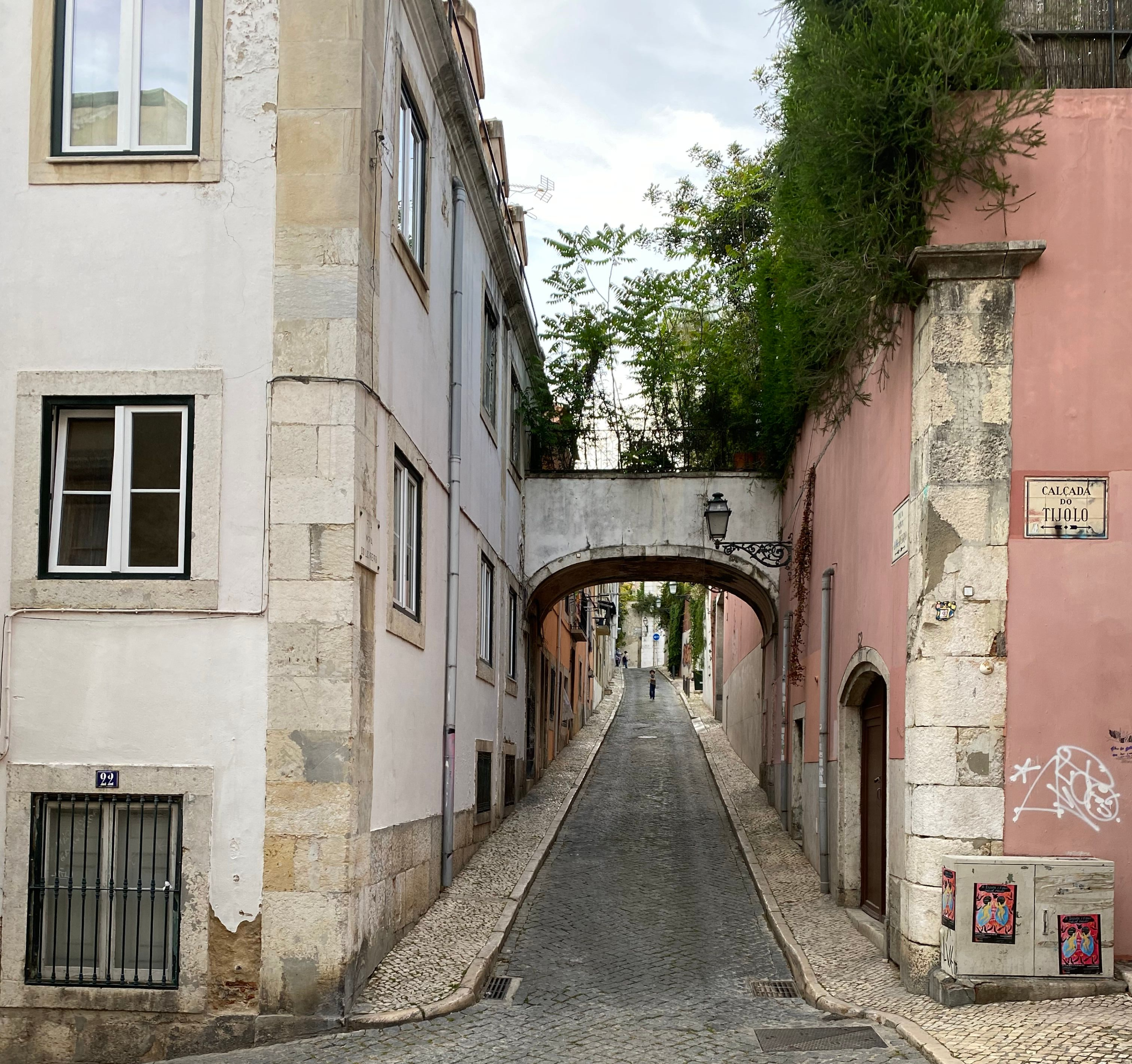A steep cobbled street in Lisbon, Portugal, used to illustrate the risks of mortgage pre-approval and CPCV deposits when buying property.
