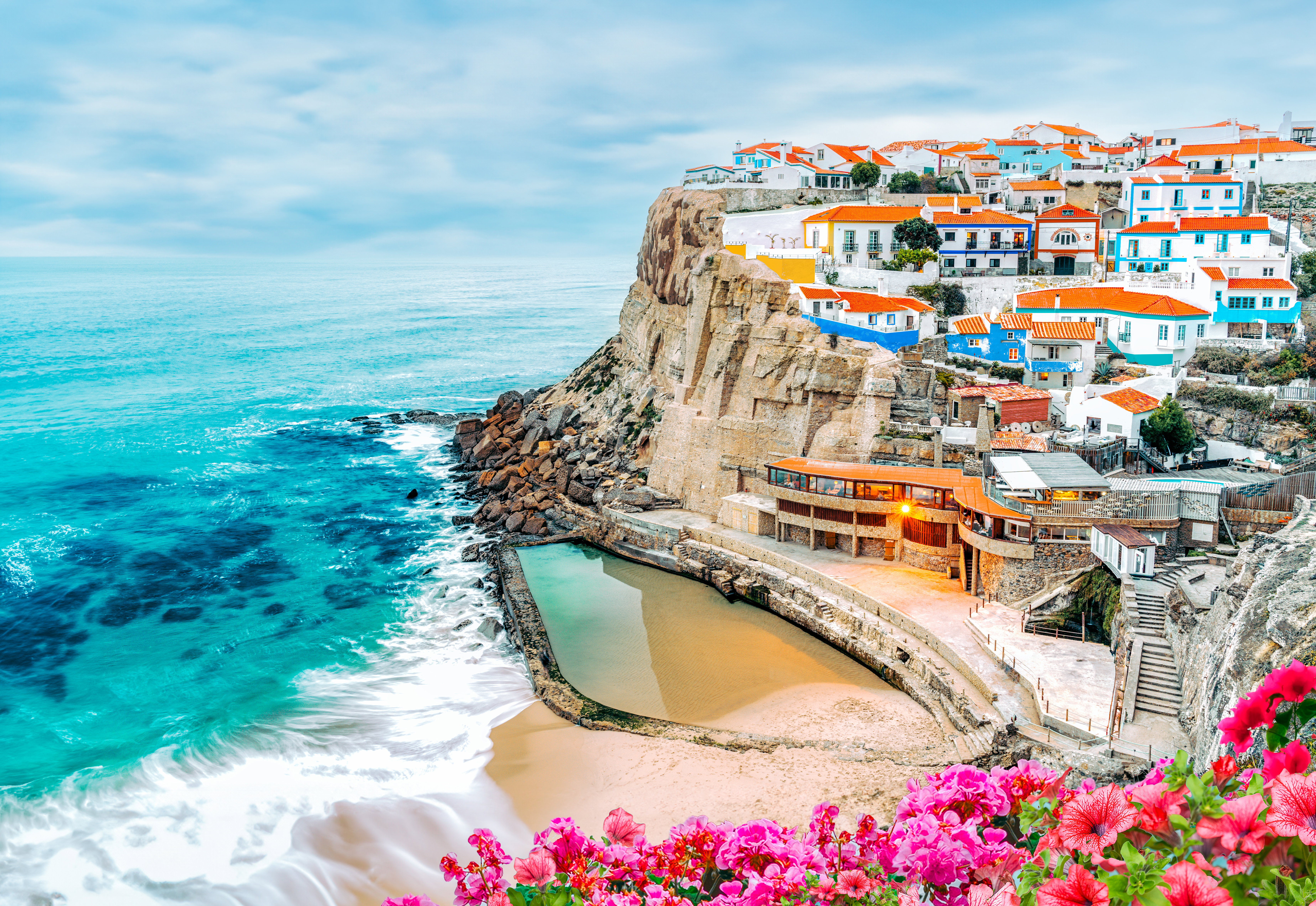 Lisbon and the Coast: Whitewashed clifftop houses and a seawater pool at Azenhas do Mar, on the coast near Sintra, west of Lisbon.