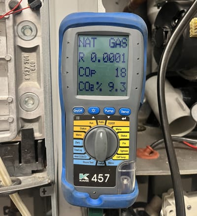 Kane 457 flue gas analyser showing a natural gas combustion reading