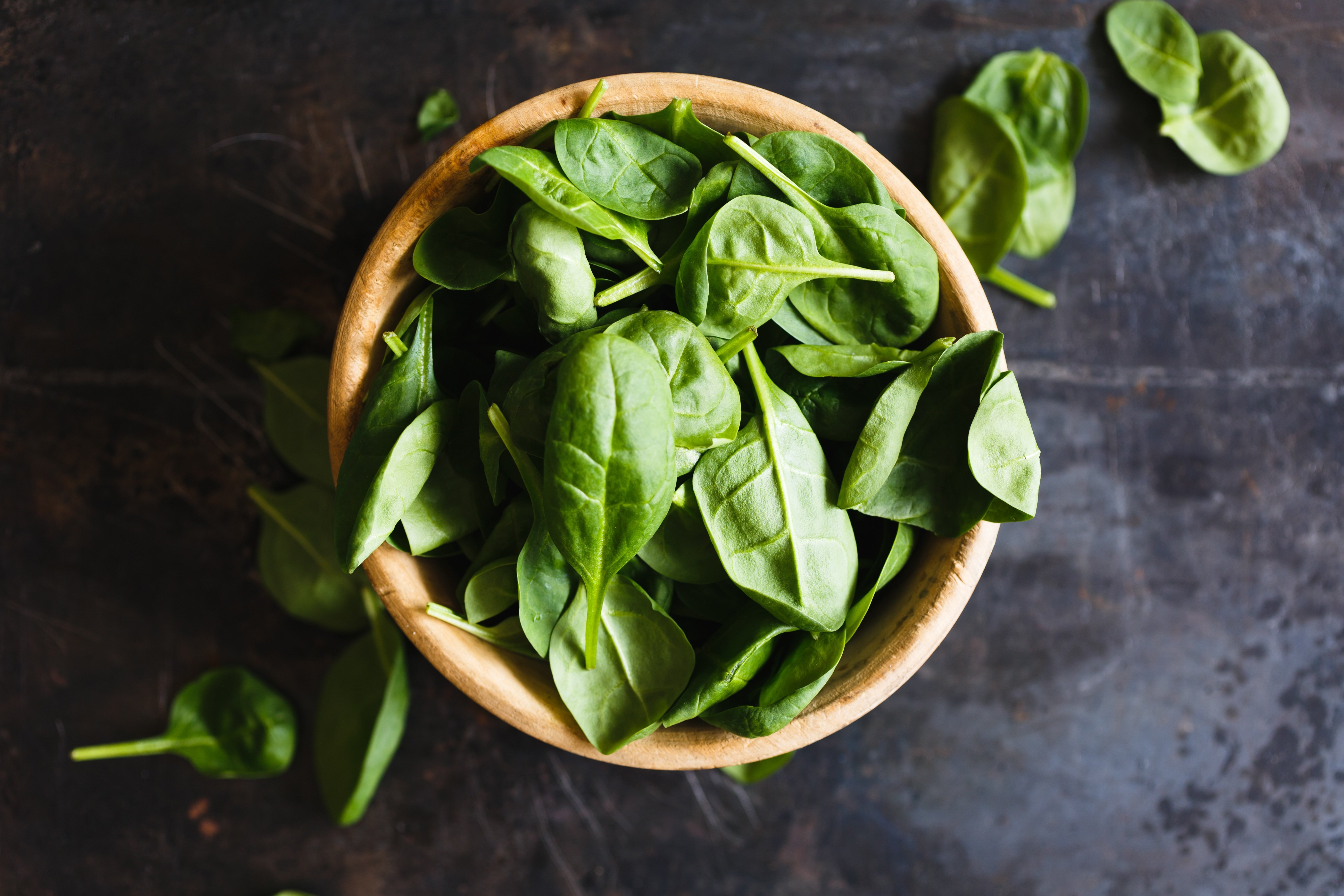 Fresh spinach leaves in bowl for healthy energy nutrition