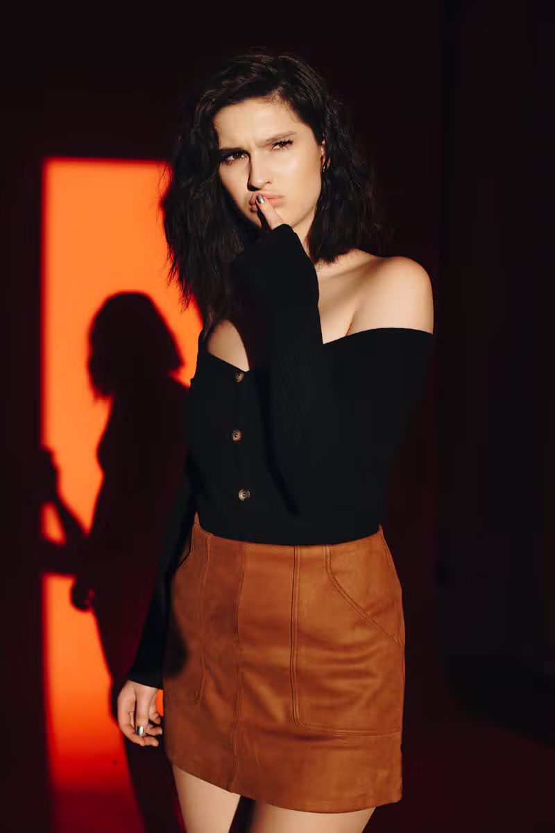 Fashion portrait in warm rust cinematic light