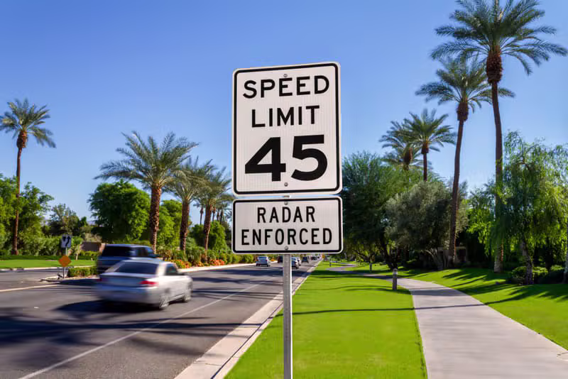 Clear speed limit sign on an open highway