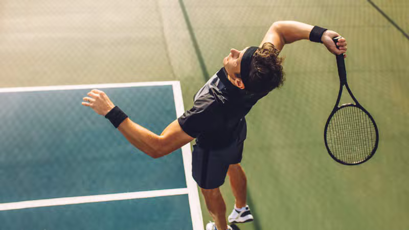 Young tennis players hitting on the court