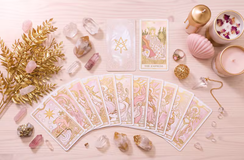 Tarot cards and candles setting a mystical mood