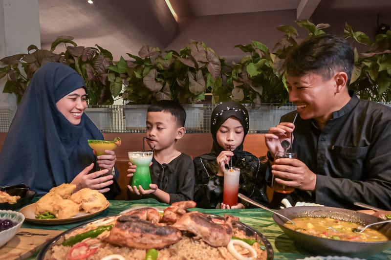 Diverse group of friends dining together in a Hong Kong restaurant