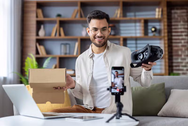Lifestyle influencer filming an unboxing video