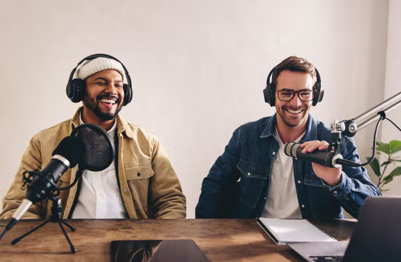Creators recording a collaborative podcast episode
