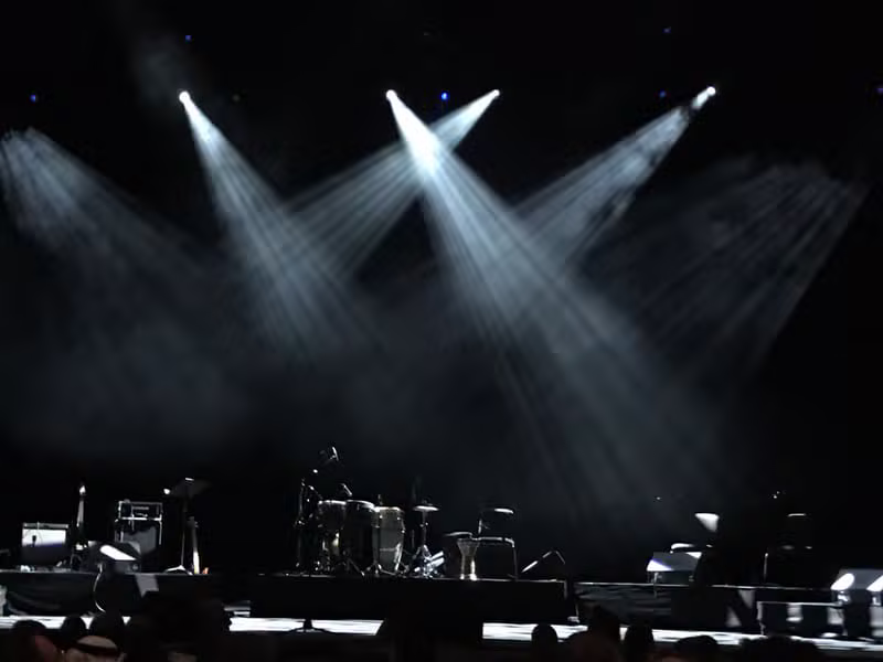 Amon White live event stage with lights