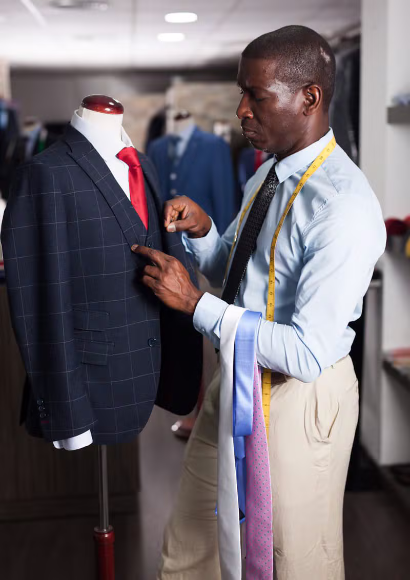 Master tailor measuring a suit