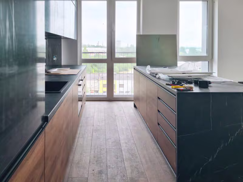A beautiful modern kitchen showcasing luxury woodwork and smooth finish