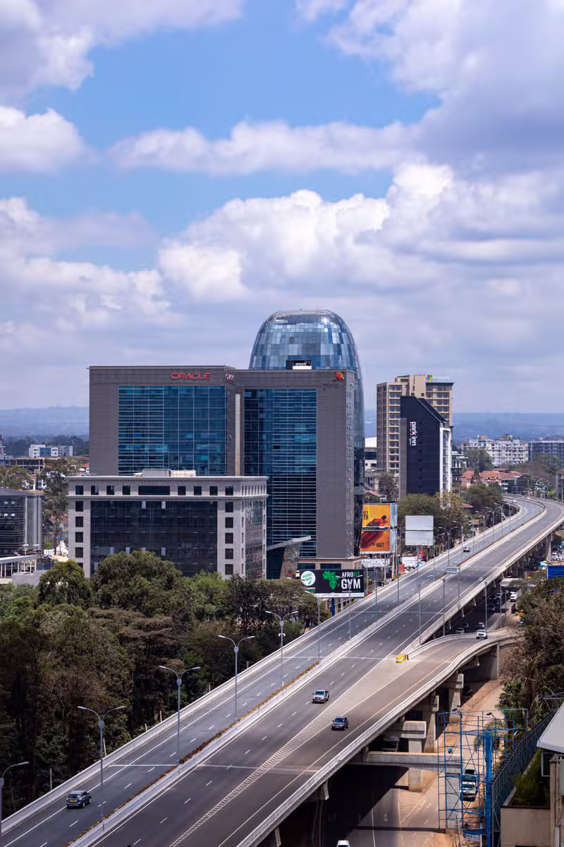 Professionals discussing financial solutions in Nairobi