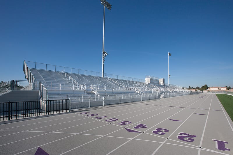 High school athletes competing in a track relay race