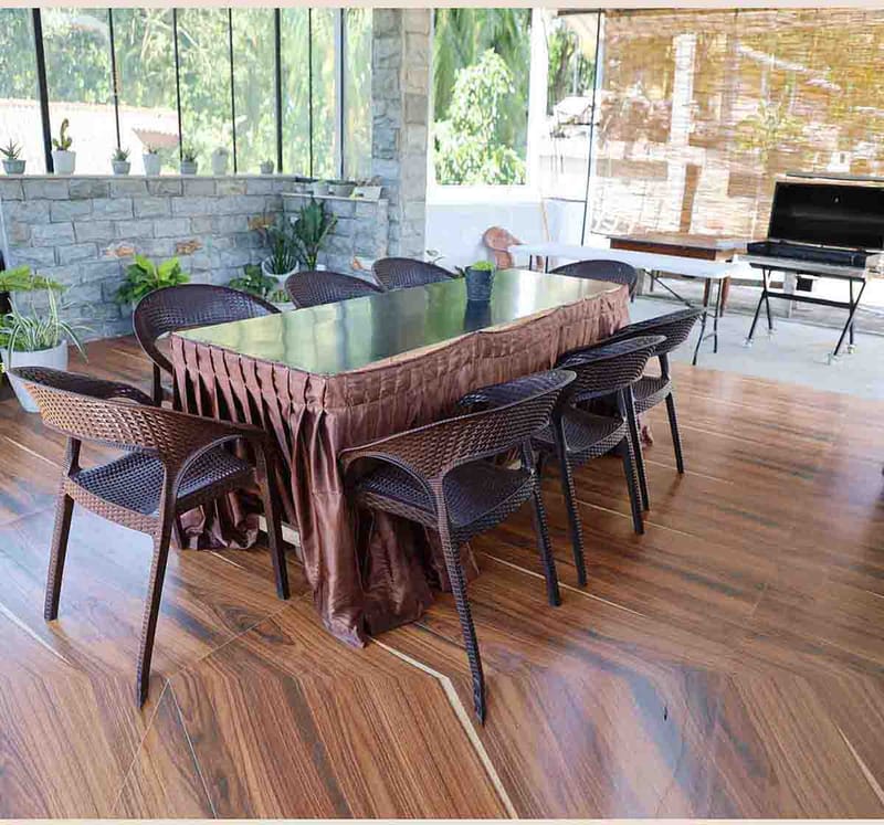 Open-air dining terrace at Mahaweli Haven with tables and tropical views