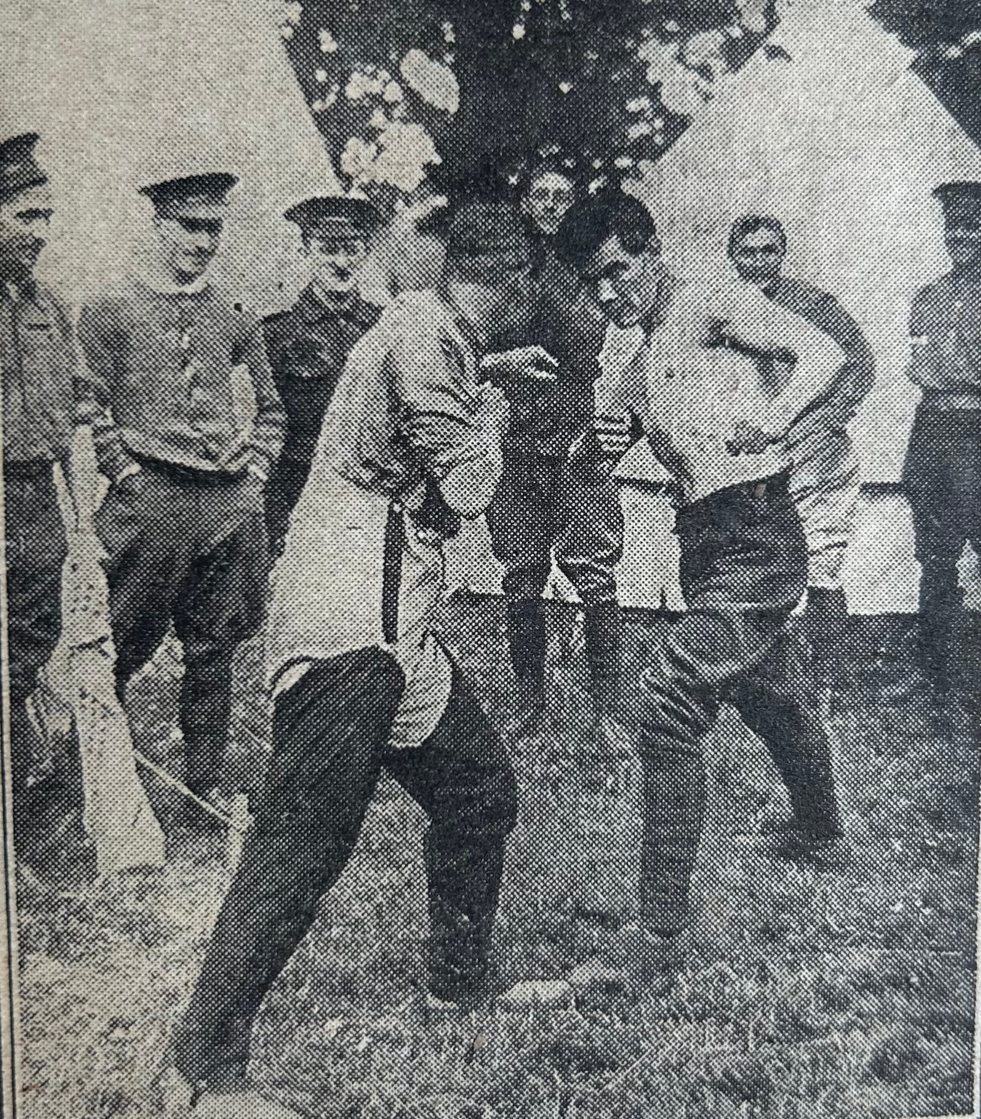 Newspaper clip entitled "Learning how to knock out a German". Tom Wood, a Canadian boxer who has joined (2nd) King Edward's Horse showing his comrades how to use their fists at Langley Park, Slough (October 1914).