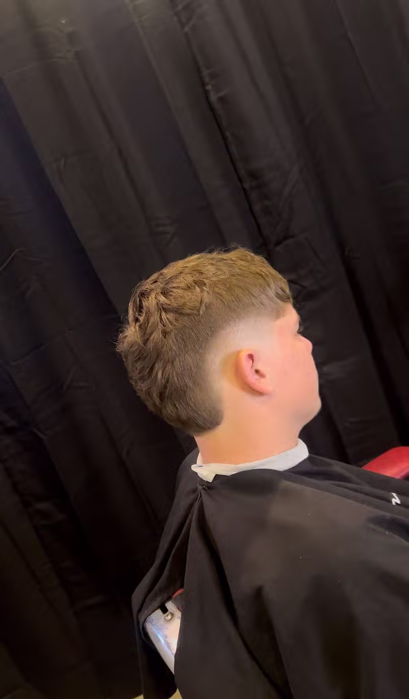 Any Haircut — Mid Burst Fade