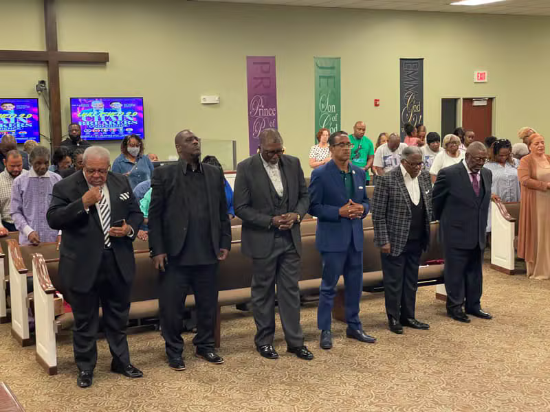Congregation in prayer during Chain Breakers 2025