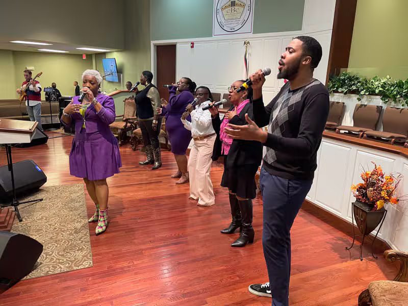 Praise singers leading the congregation in worship