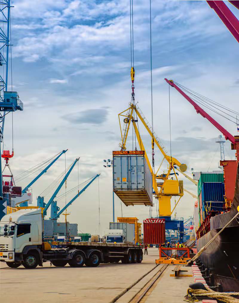 Container ship being loaded at an international cargo port