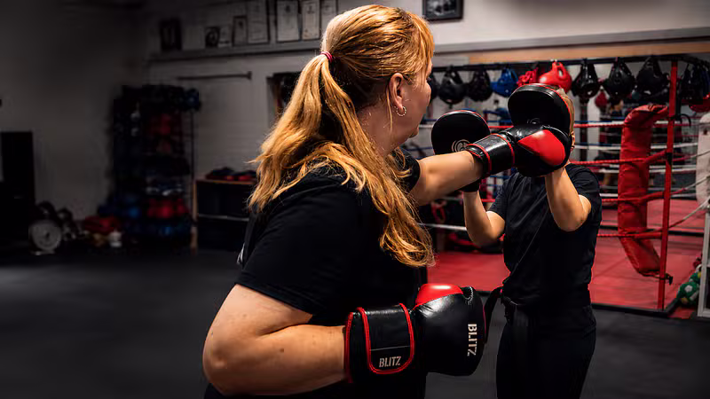 Kickboxing pad work training at TKBA
