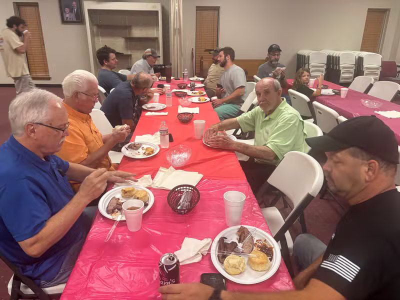 Church community enjoying a fellowship meal together