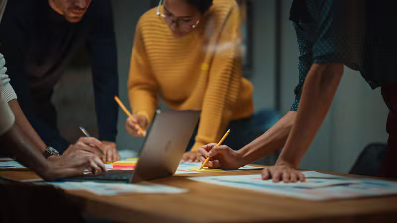 Marketing team collaborating in a modern office