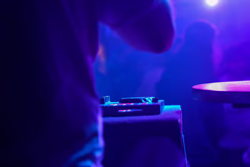 DJ spinning tracks in a club