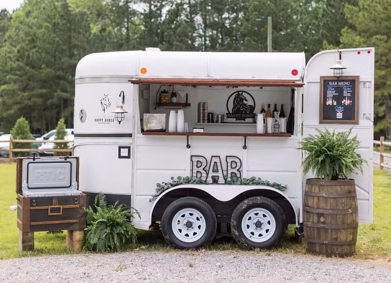 Vintage horse trailer converted to a beautiful mobile bar