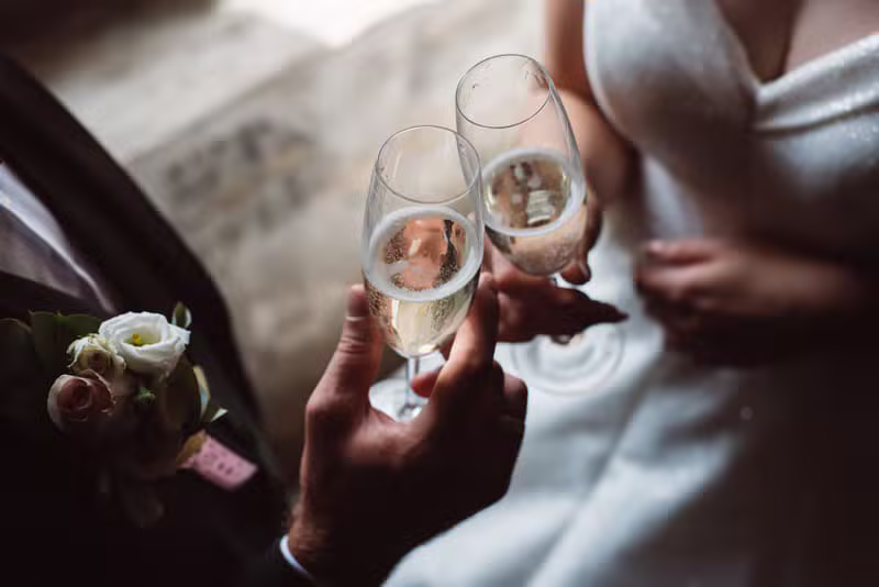 Champagne glasses clinking in celebration