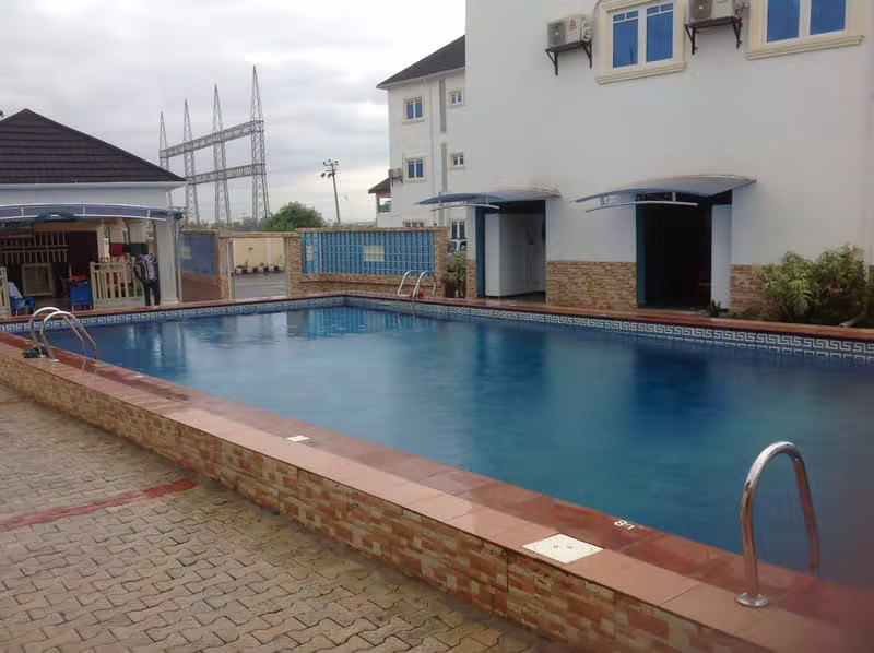 OSPUC HOTEL swimming pool and exterior building in Owerri
