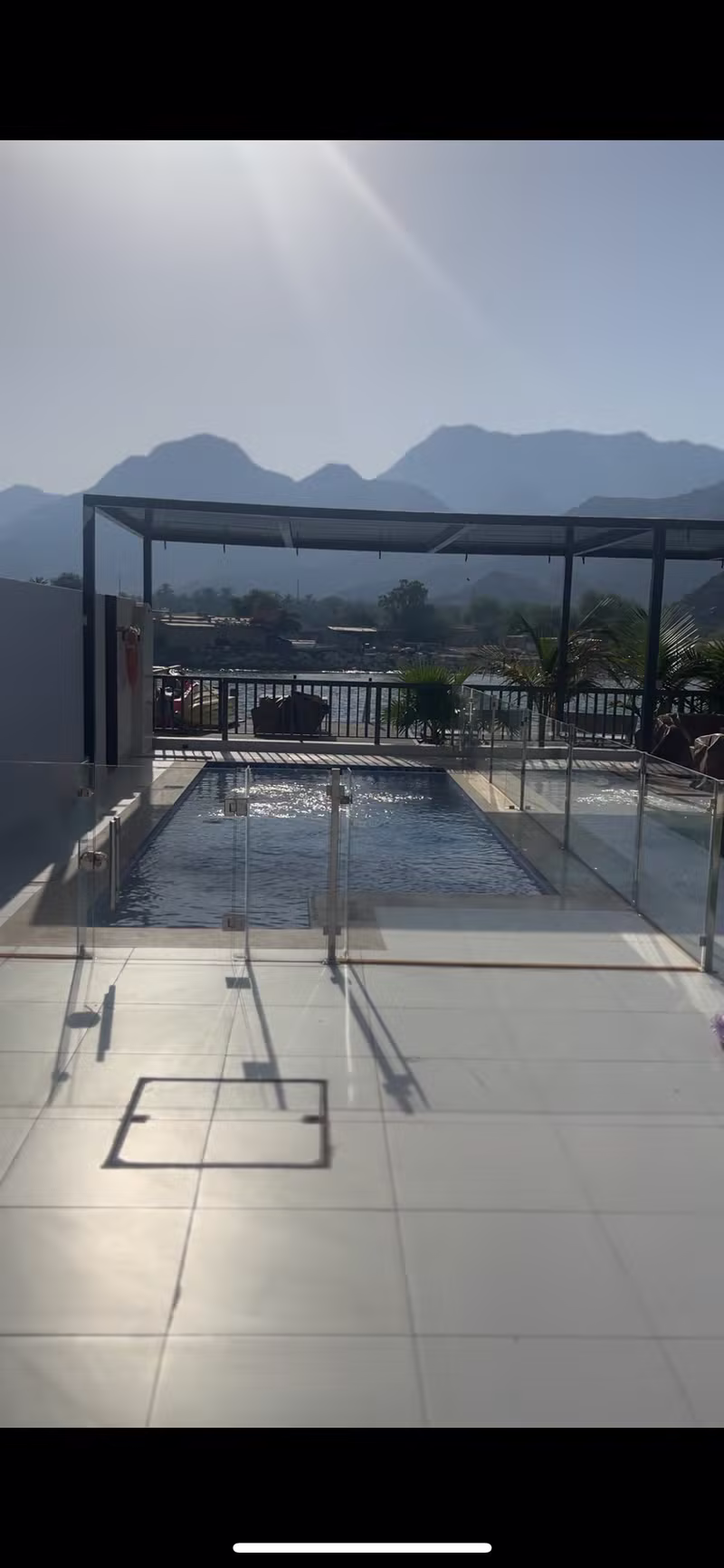 Sunny private villa swimming pool overlooking the sea and mountains