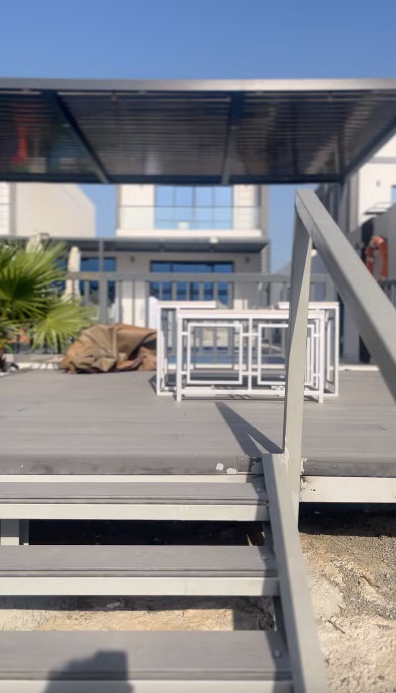 Outdoor stair and deck area at Turjman Oasis Villa