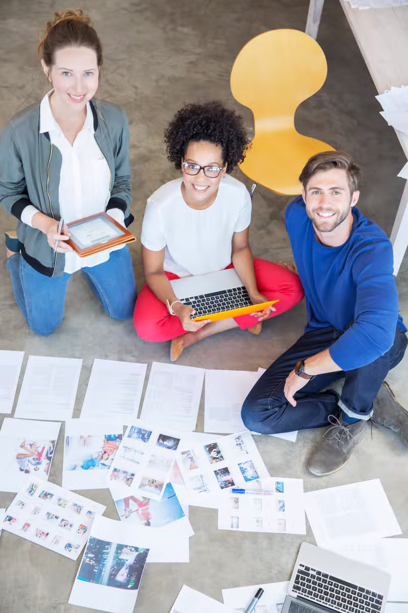 Freelance marketing planning session with campaign data, creative assets, and customized strategy notes