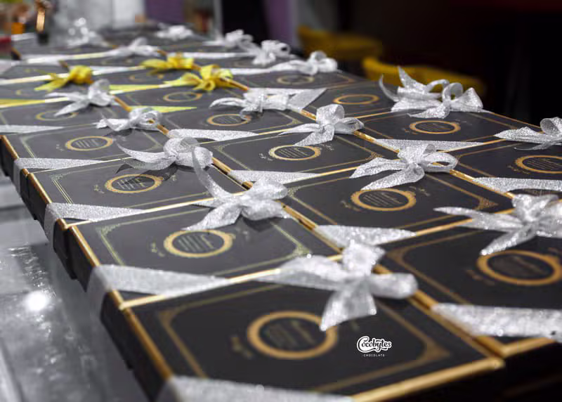 Luxury black gift boxes tied with silver ribbons