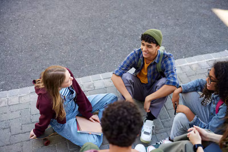 Confident teenager smiling outdoors