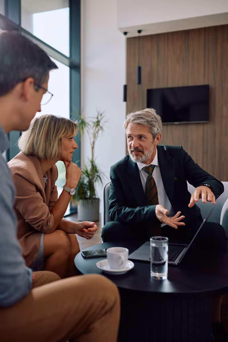 Financial consultant advising a business client on loan options