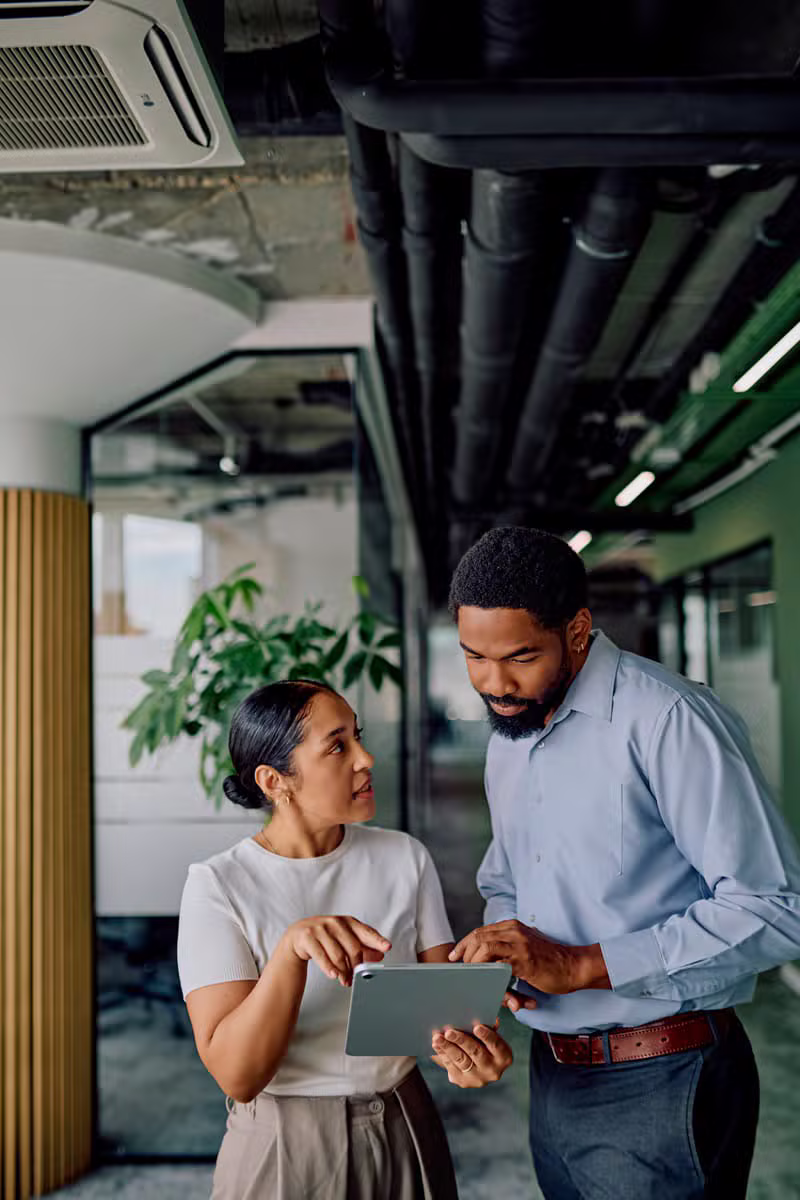 Financial team collaborating on a business solution in a modern office