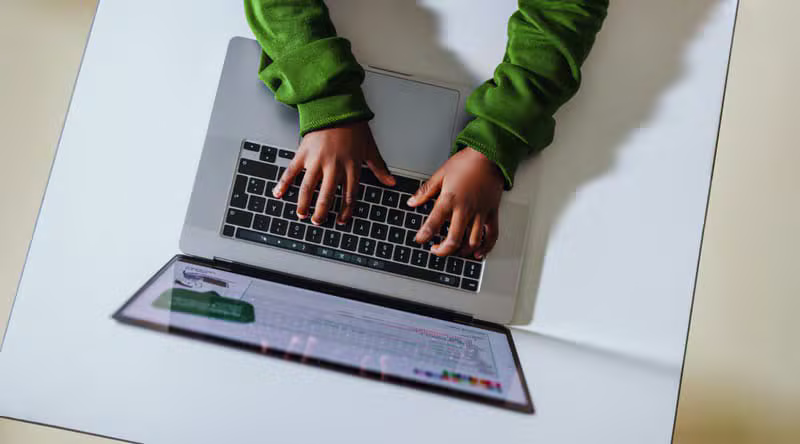 African students developing practical digital skills in a classroom
