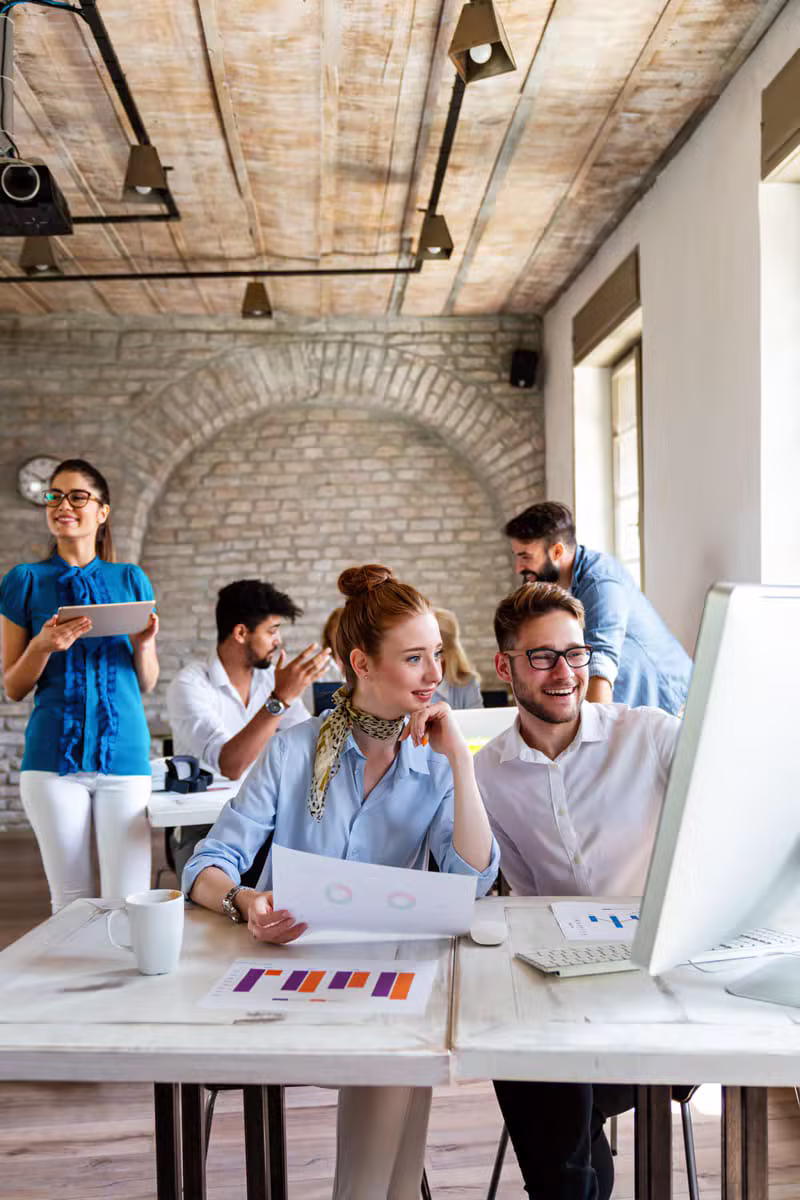 Real estate team meeting in a modern office