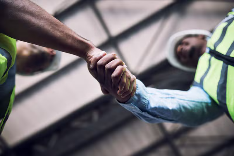 Contractors shaking hands