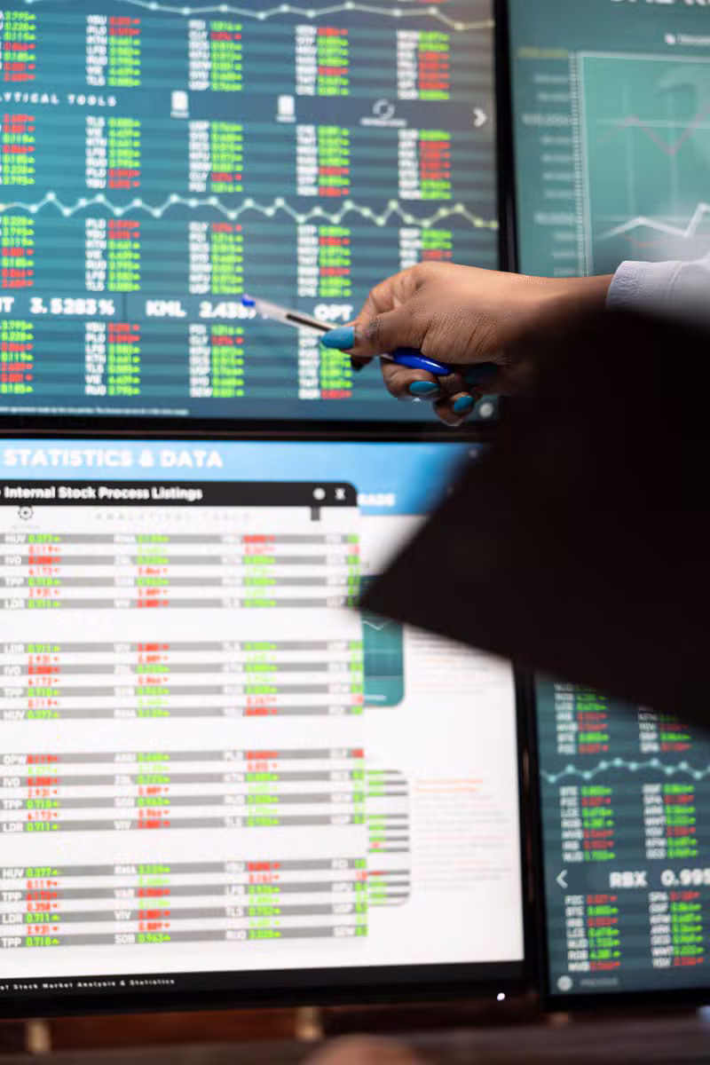 Professional forex trading desk with market charts