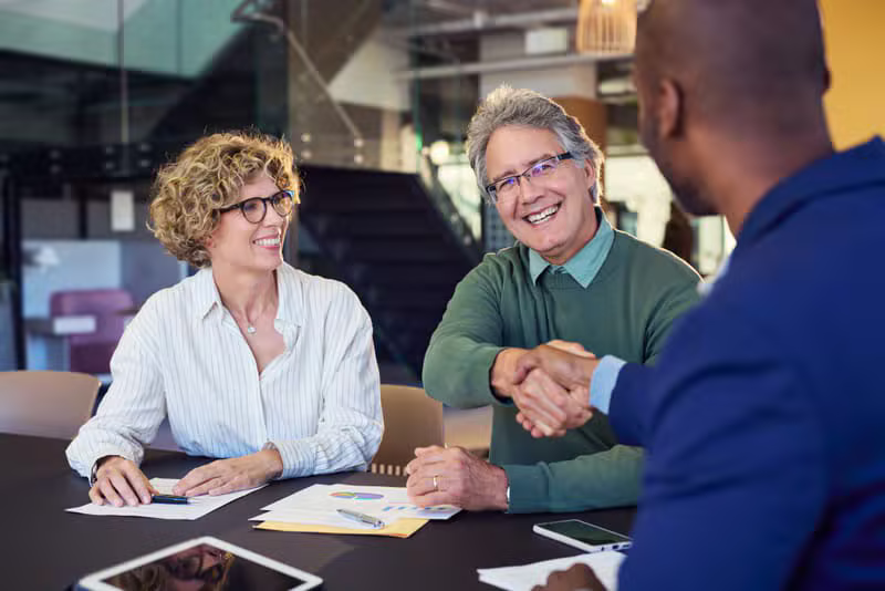 Senior couple meeting with an insurance advisor
