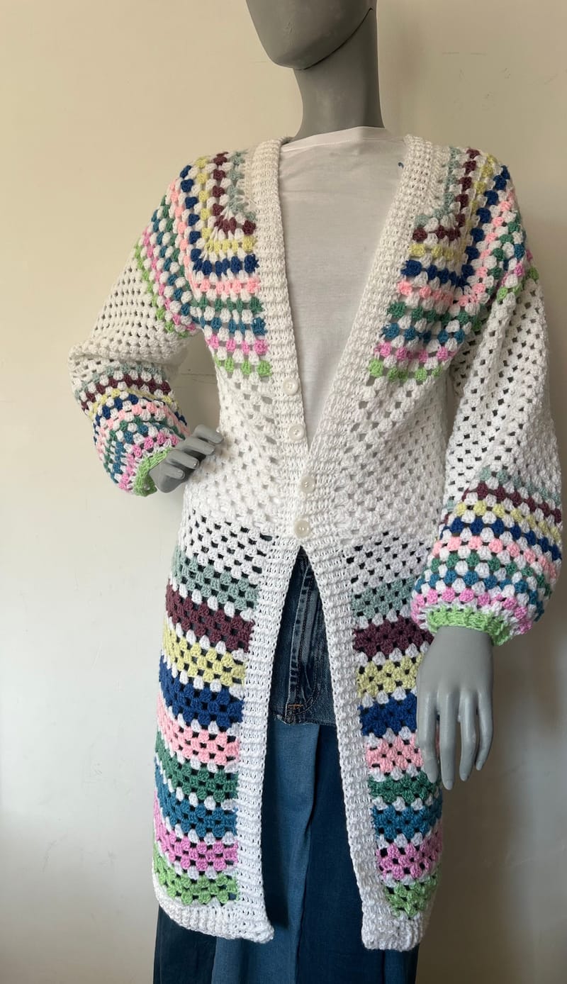 Pureheid lange vest