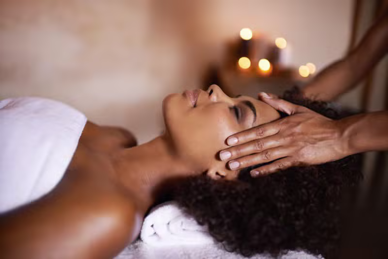Black African woman enjoying a spa treatment
