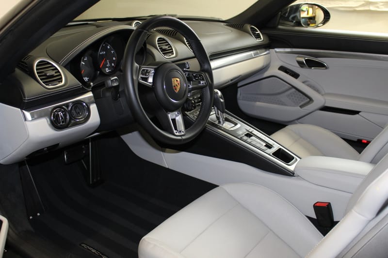 Luxury car being detailed to a flawless shine