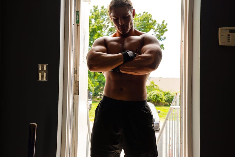 Man training intensely in dark setting