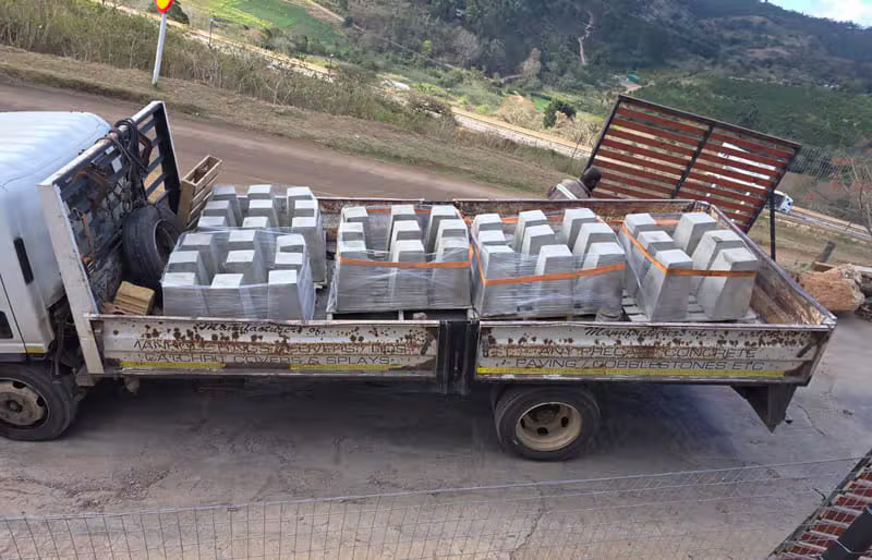 Flatbed truck loaded with concrete products