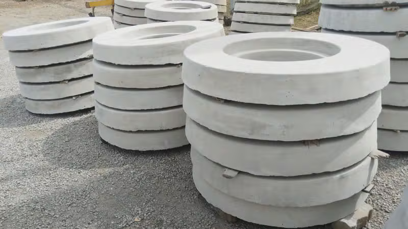 Stacked concrete manhole rings